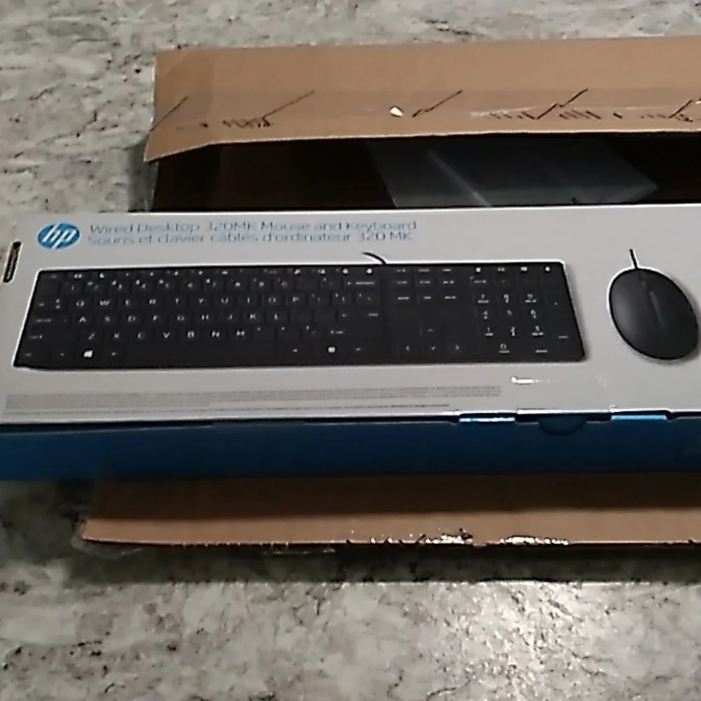 Brand new in box Hp Wired 320k keyboard & mouse